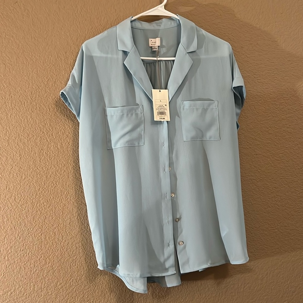 Baby blue button up blouse. Size Women’s Large. Target shirt.